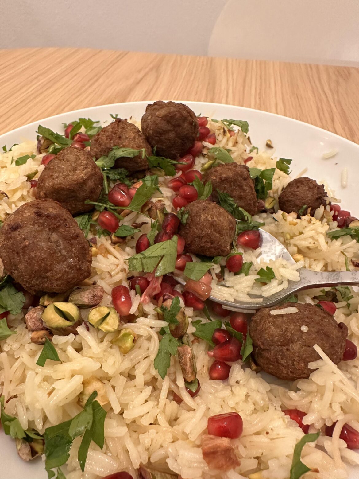 Leftover special, meatballs with Lebanese style pilaf, with vermicelli, pistachios and pomegranate.