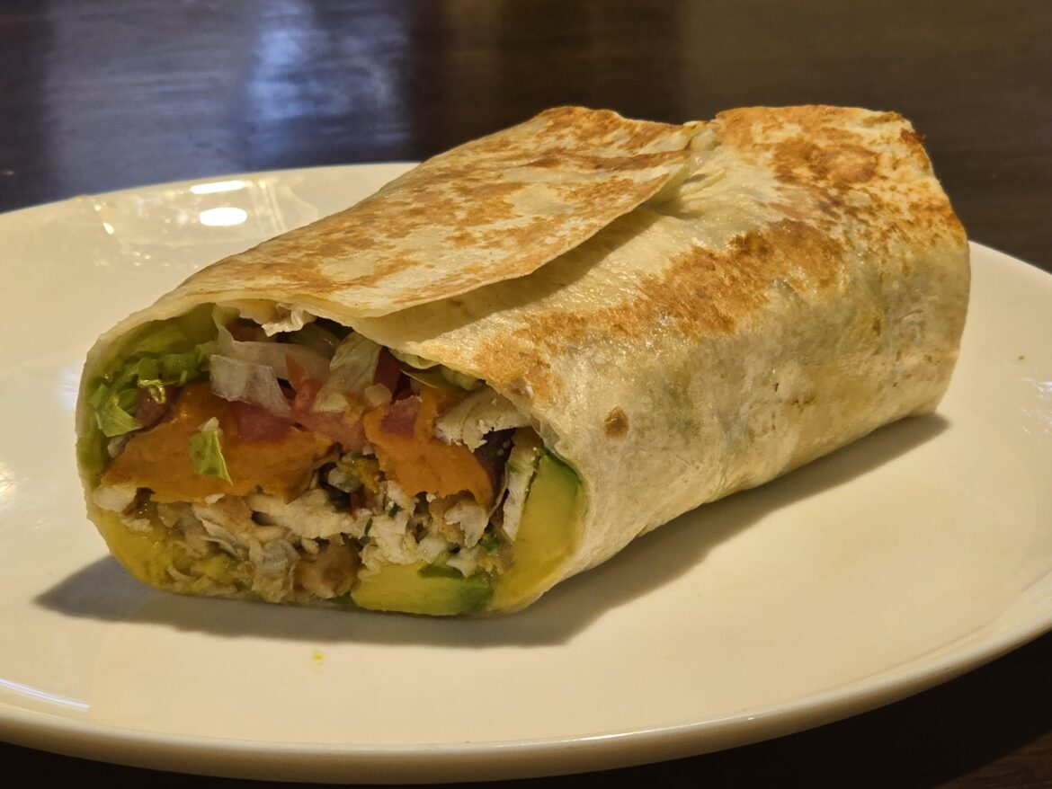 Wrap from all around the world - chicken shawarma, sweet potato, avocado, lettuce and pico de gallo, with spicy mayo and chimichuri.