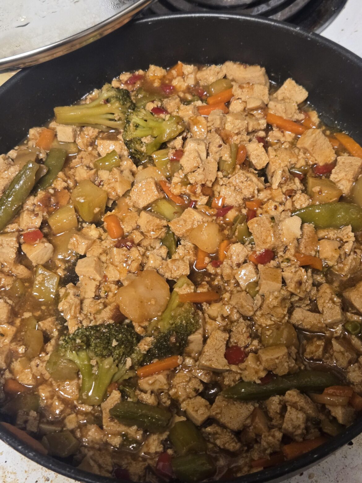 Tofu with sesame teriyaki sauce and stir fry veggies. Will be serving with basmati rice.