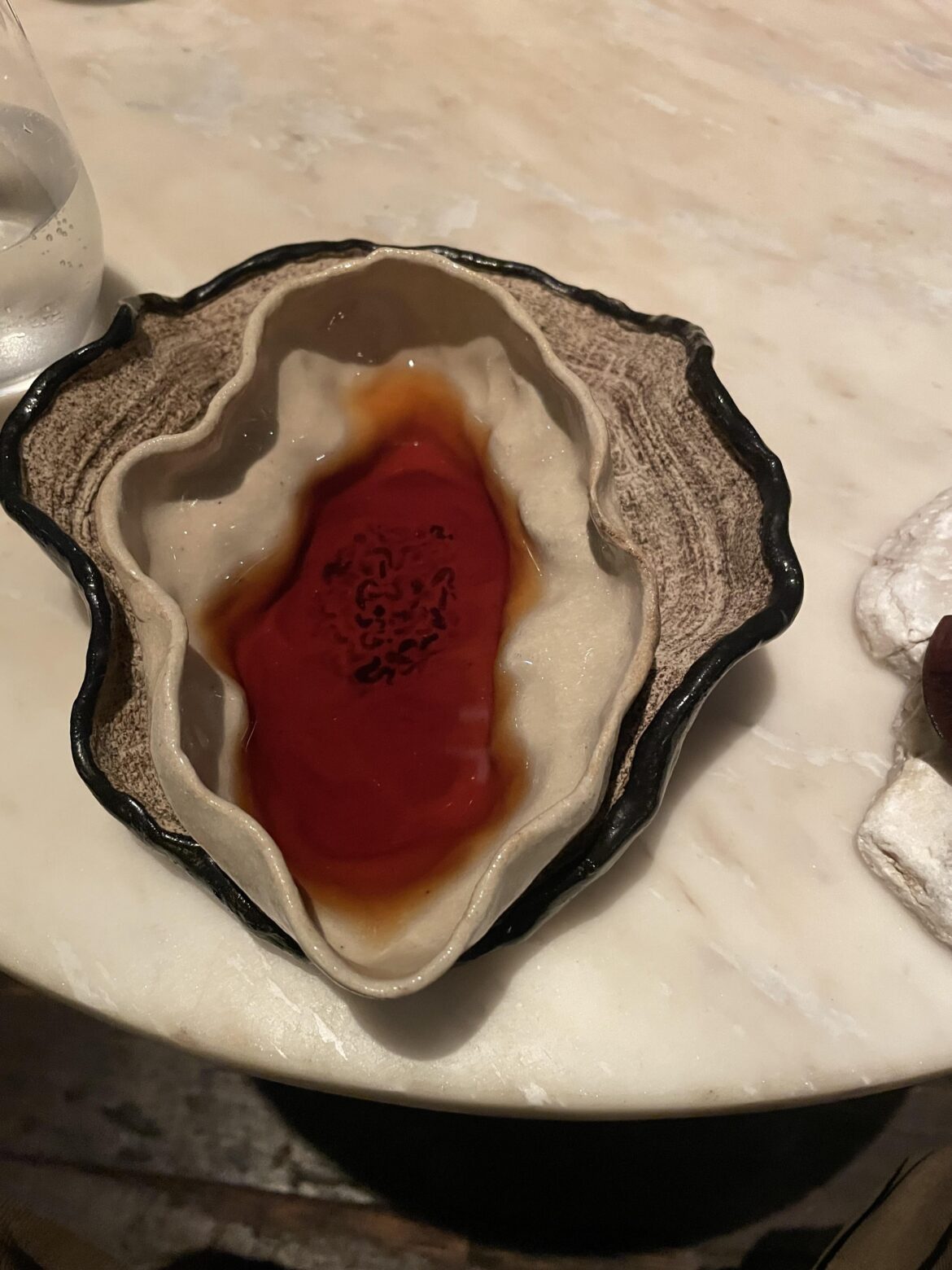 Cocktail served in an oyster shell