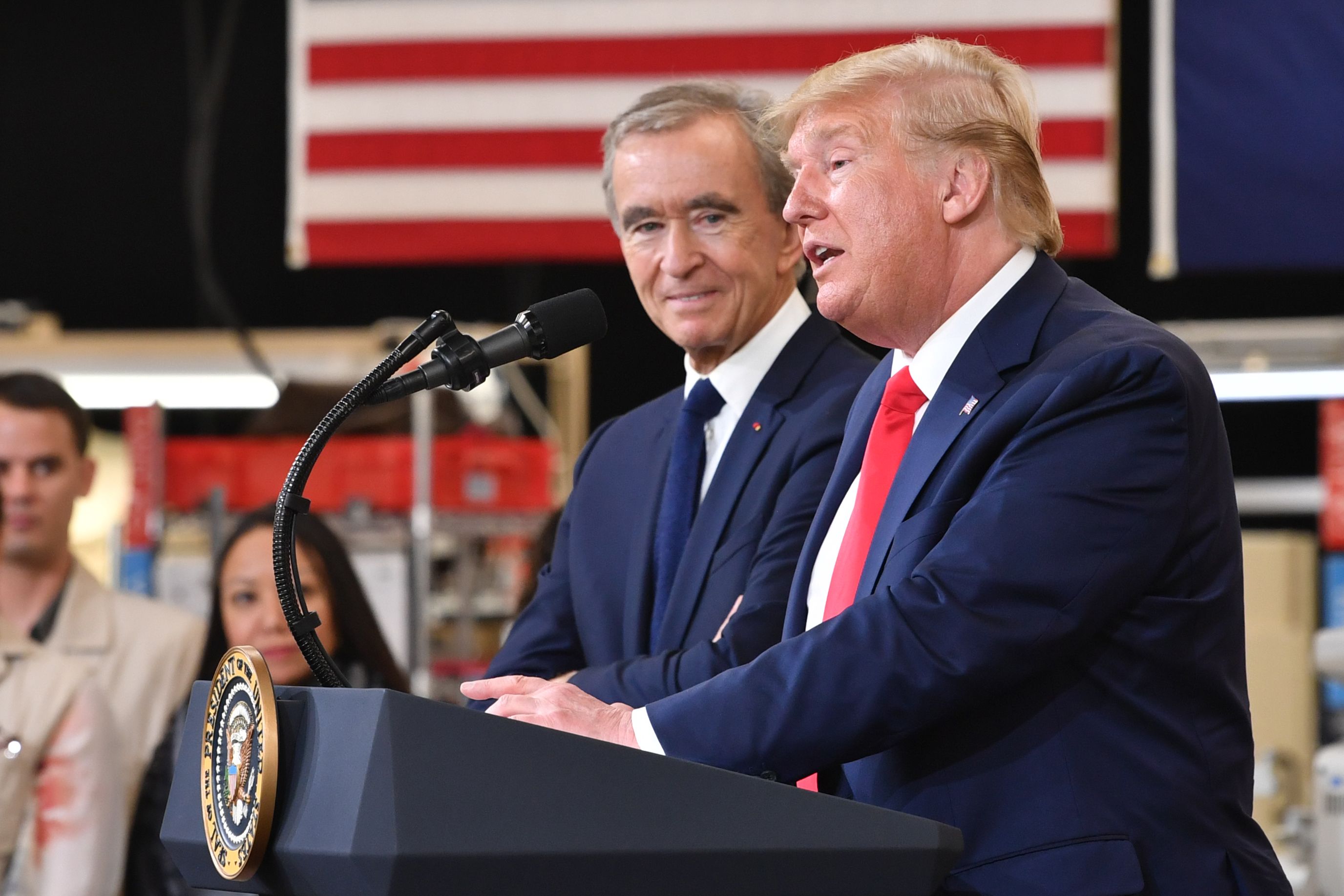President Trump speaking at a Louis Vuitton factory opening, with Bernard Arnault.