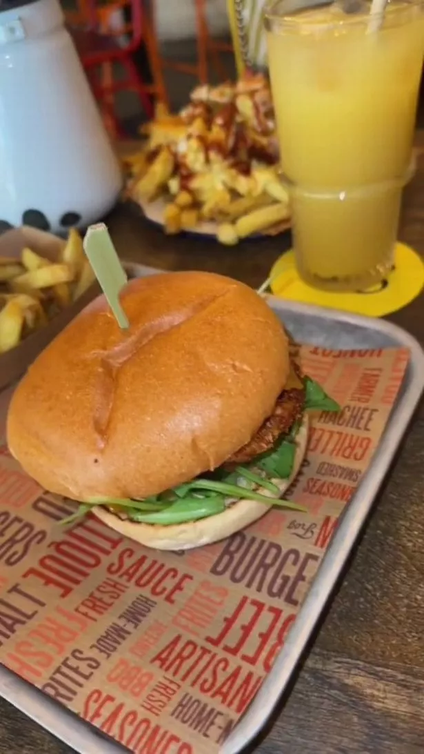 a chicken burger on a tray