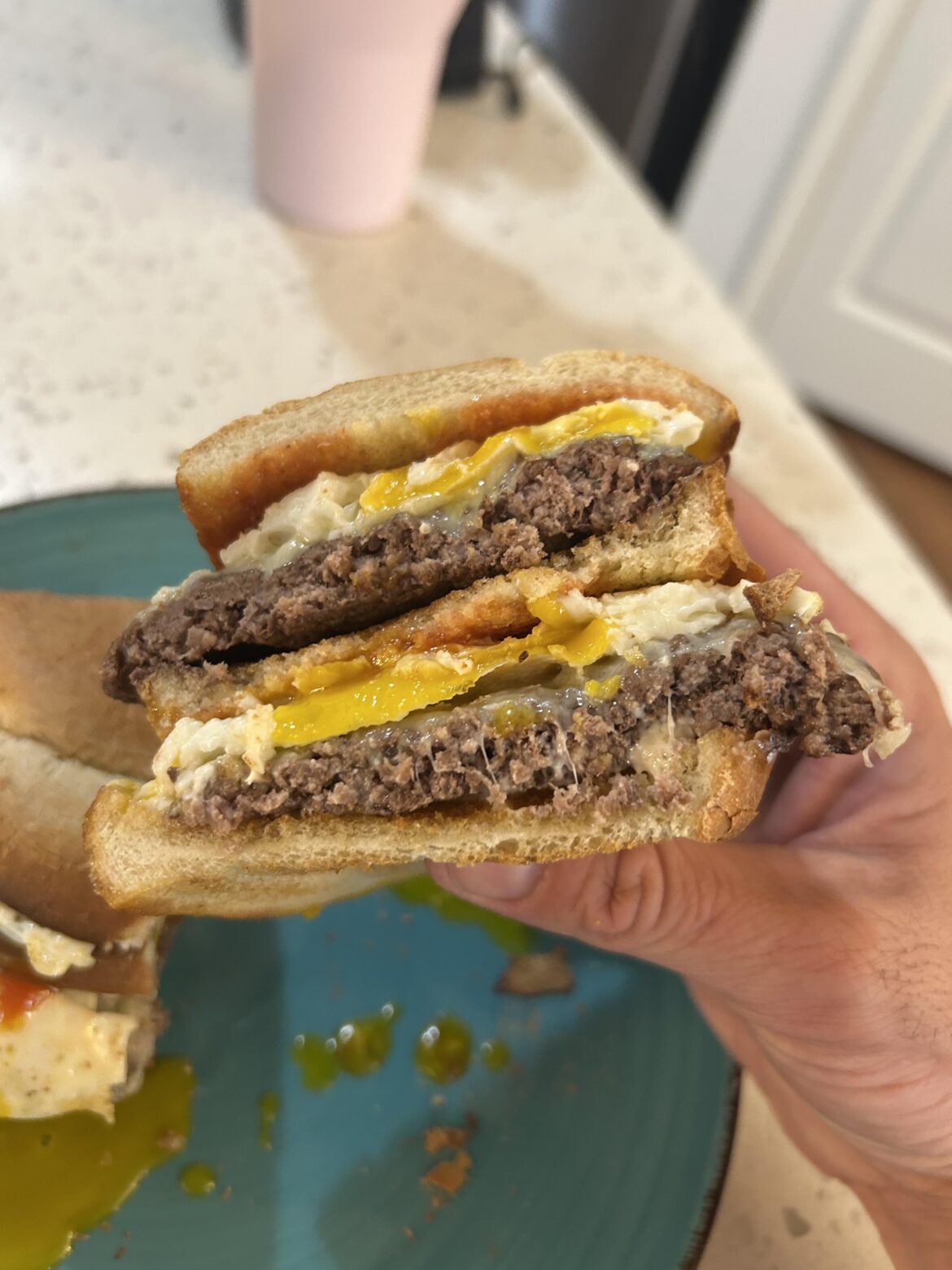 Breakfast Double “Smash” with Egg and Swiss on Italian Bread