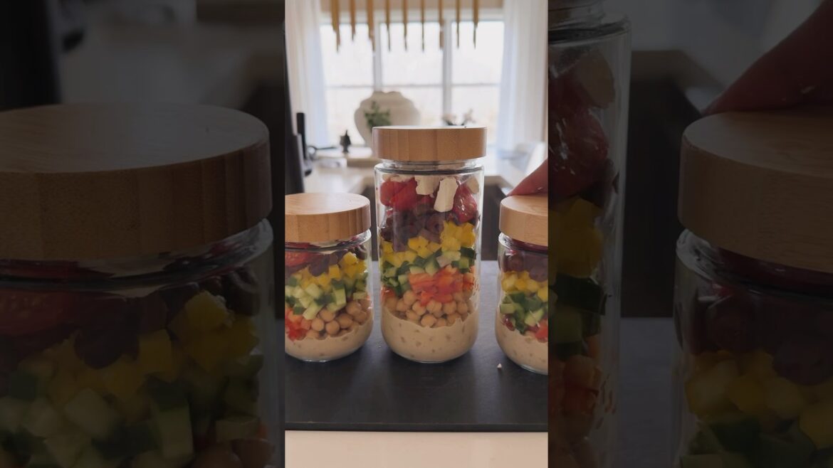 This Mason Jar Greek Salad with Tahini Dressing is the perfect meal prep! #salad #mealprep This Mason Jar Greek Salad with Tahini Dressing is the perfect meal prep! #salad #mealprep