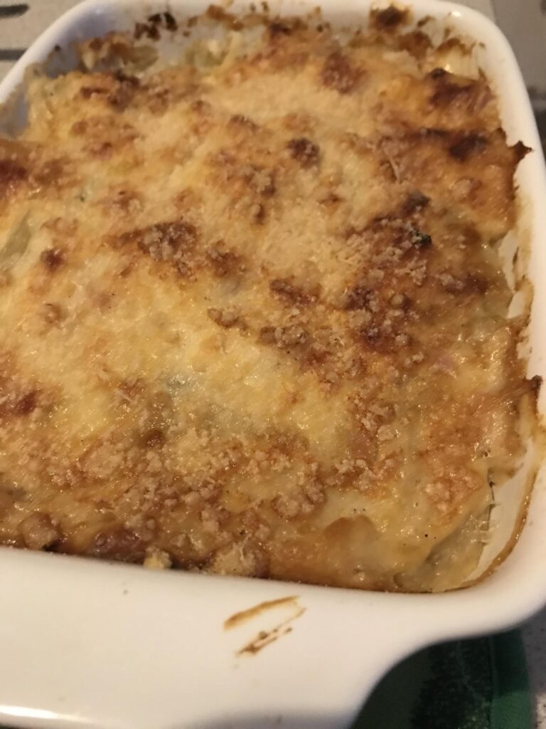 Boiled fennel and baked in oven with bechamel sauce, diced ham and Parmesan 😋