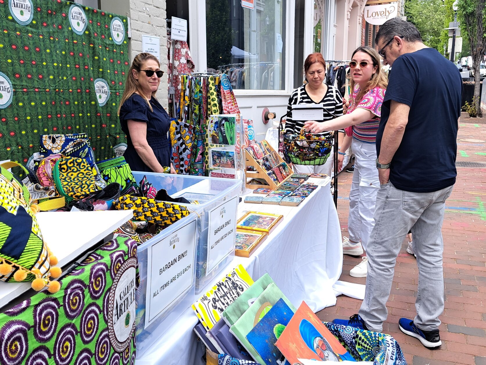 Elizabeth Jaffee, owner of Gallery Article 15, participates in Georgetown's annual French-inspired sidewalk sale.