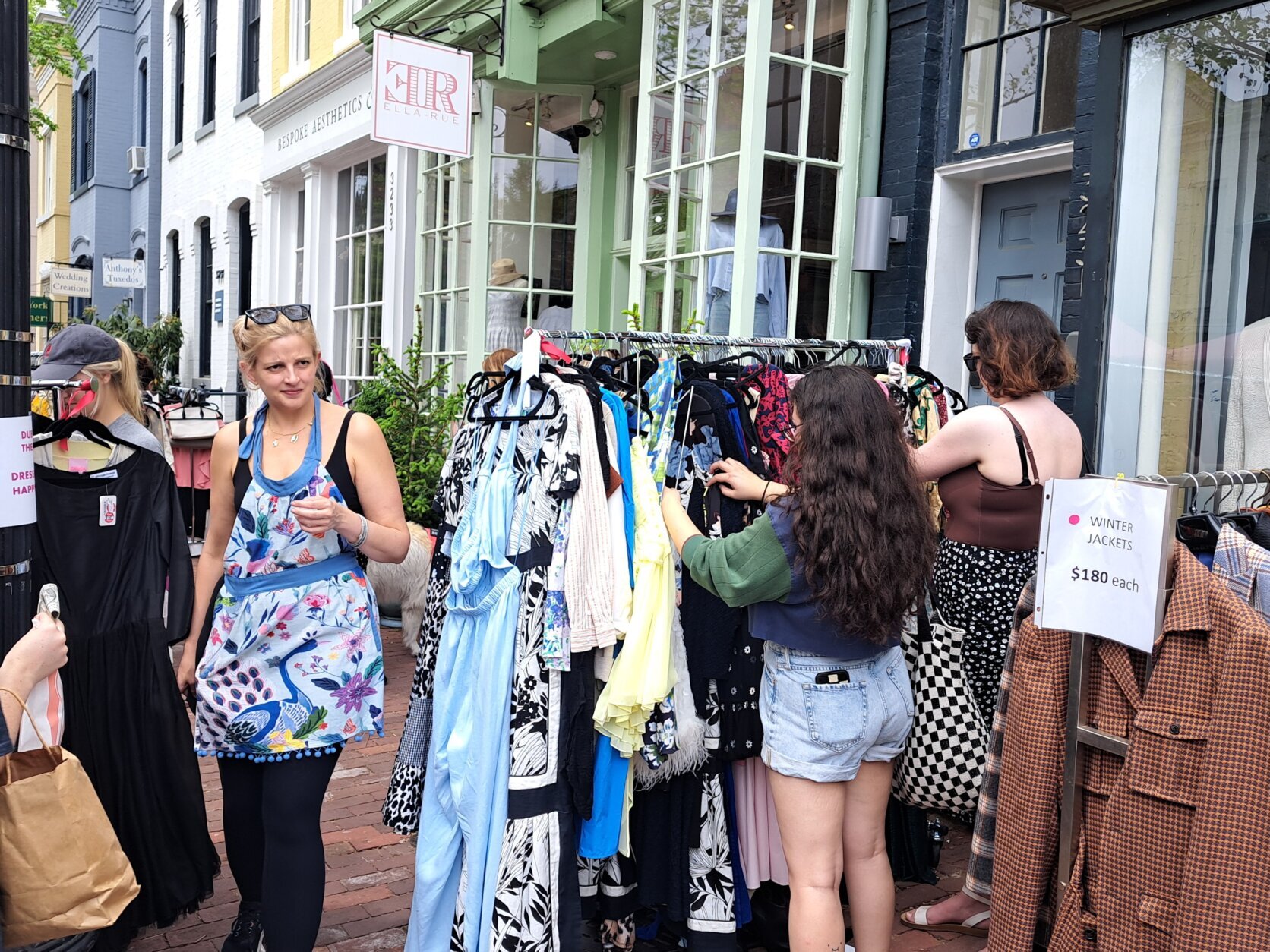 Krista Johnson, of high-end consignment shop Elle Rue, says the yearly open-air market "livens up Georgetown."