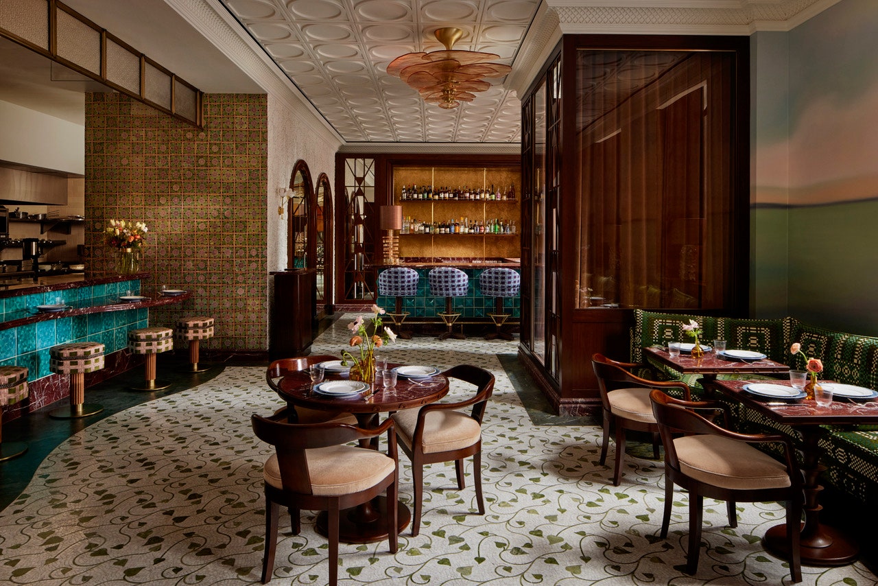 Image may contain Architecture Building Dining Room Dining Table Furniture Indoors Room Table and Chair