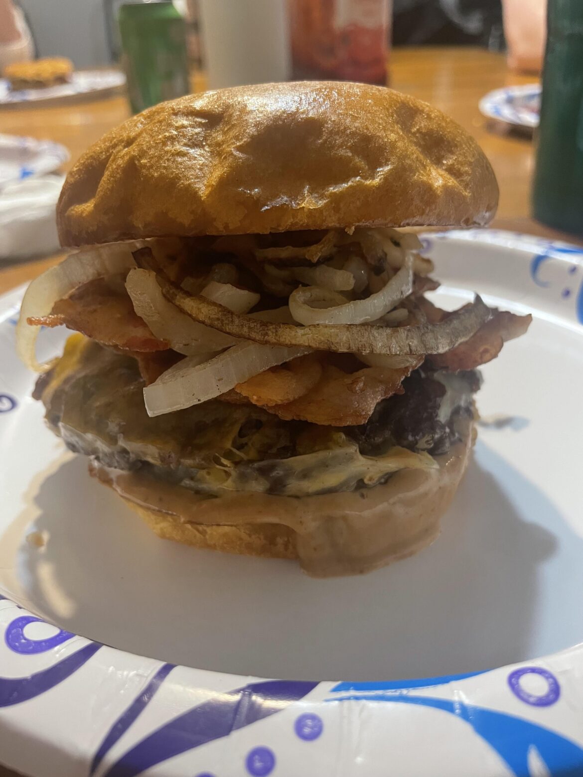 Double smash cheeseburgers with bacon and onions