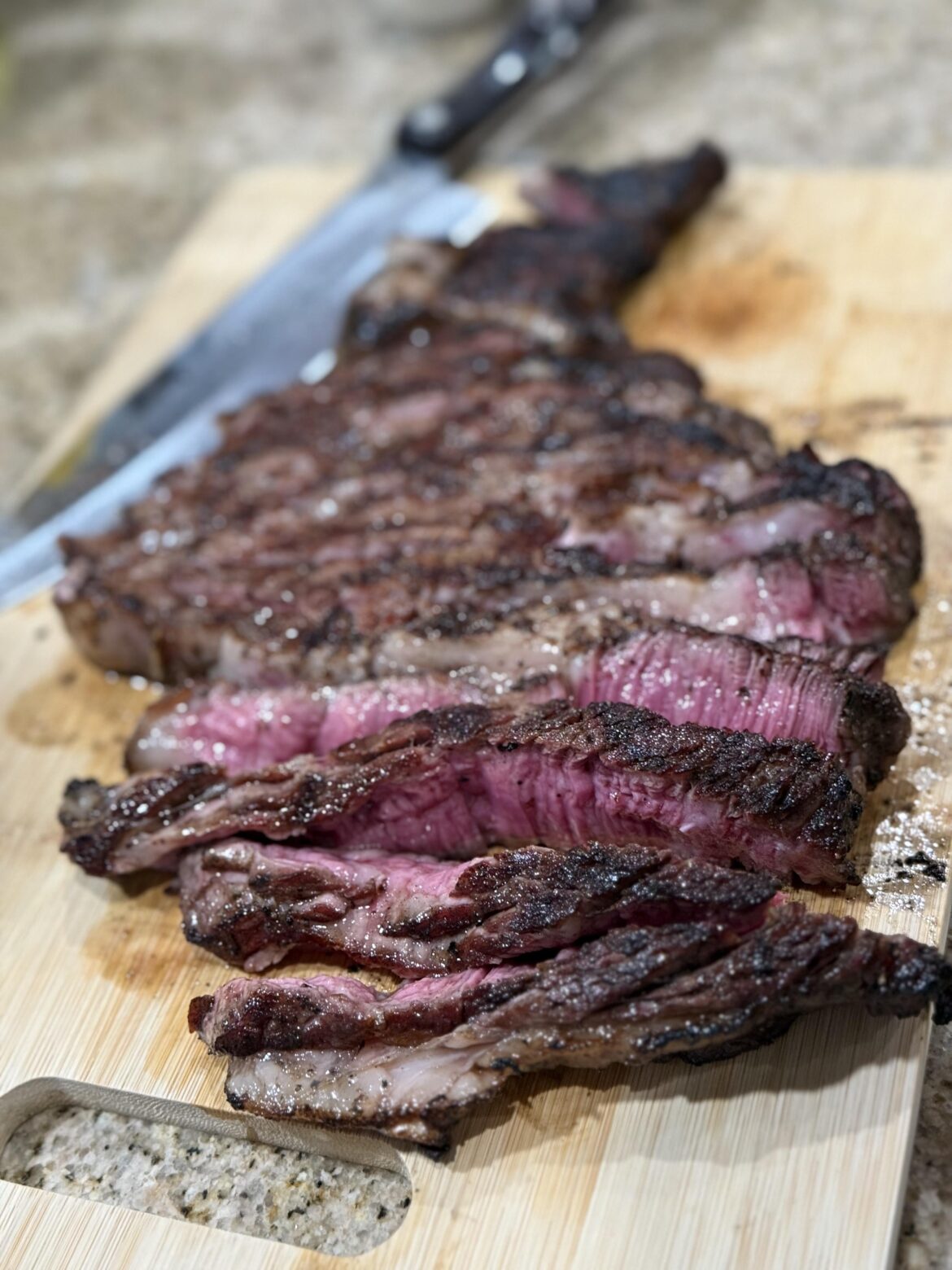 Ribeye cooked over charcoal. Favorite thus far!