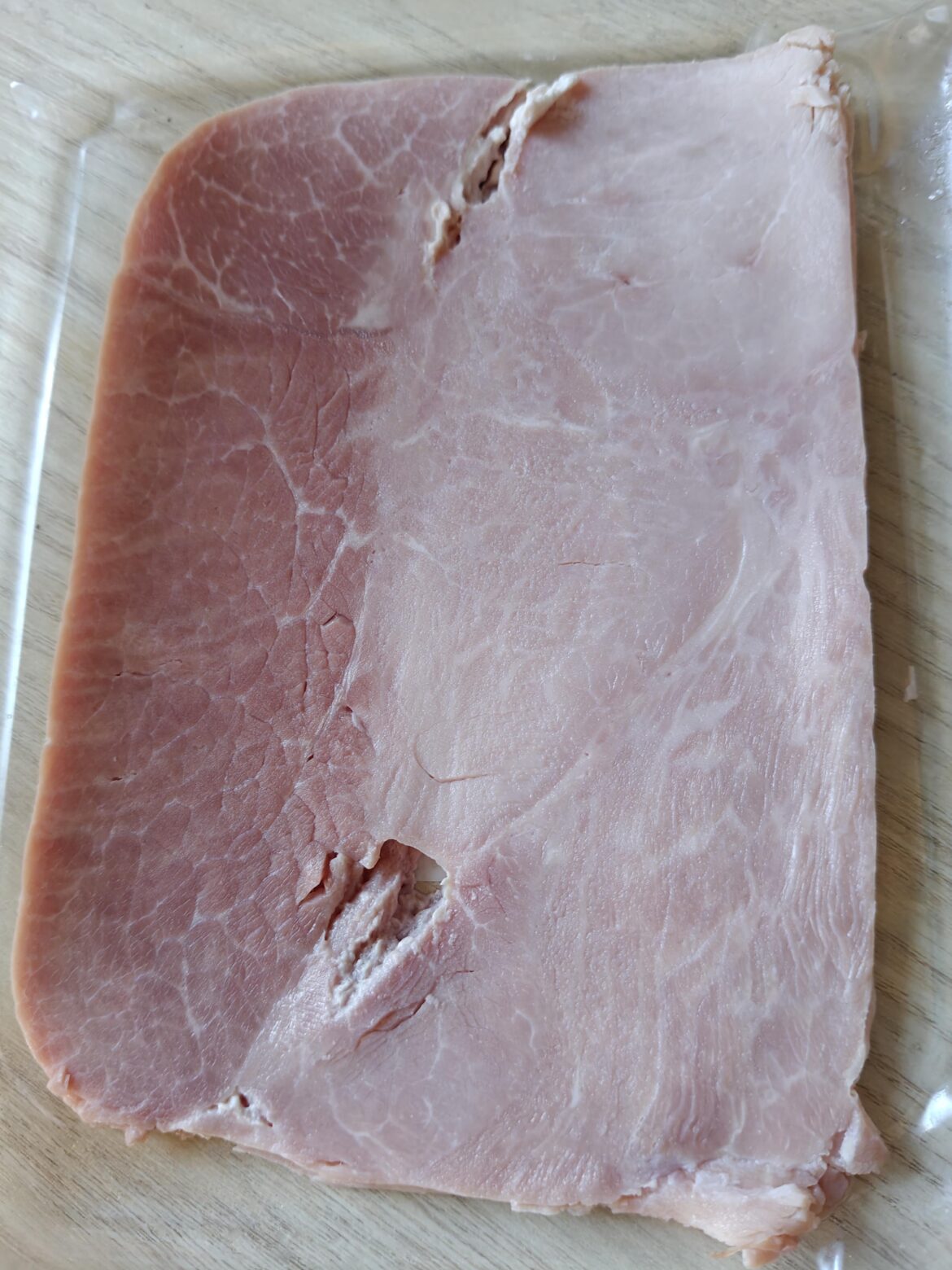 My wife think this ham is not a slice but is a formed meat. What do you think ?