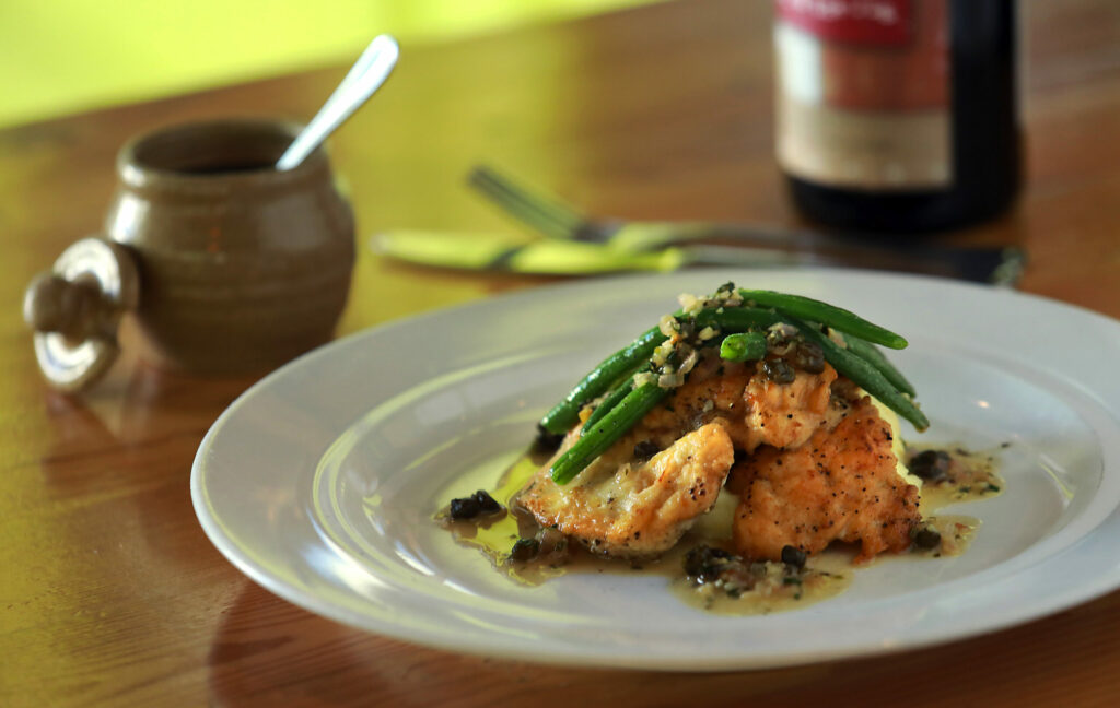 Chicken Paillard with blue lake beans, mashed potatoes and lemon caper sauce from the Fig Cafe in Glen Ellen. (John Burgess/The Press Democrat)