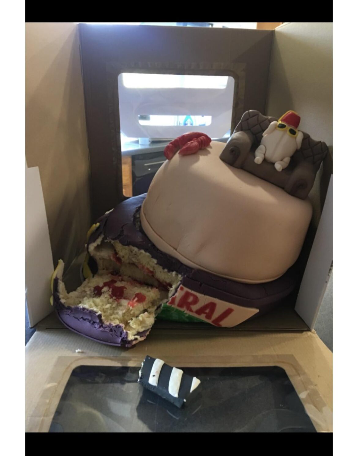 Cake collapsed during travel. Customer upset.