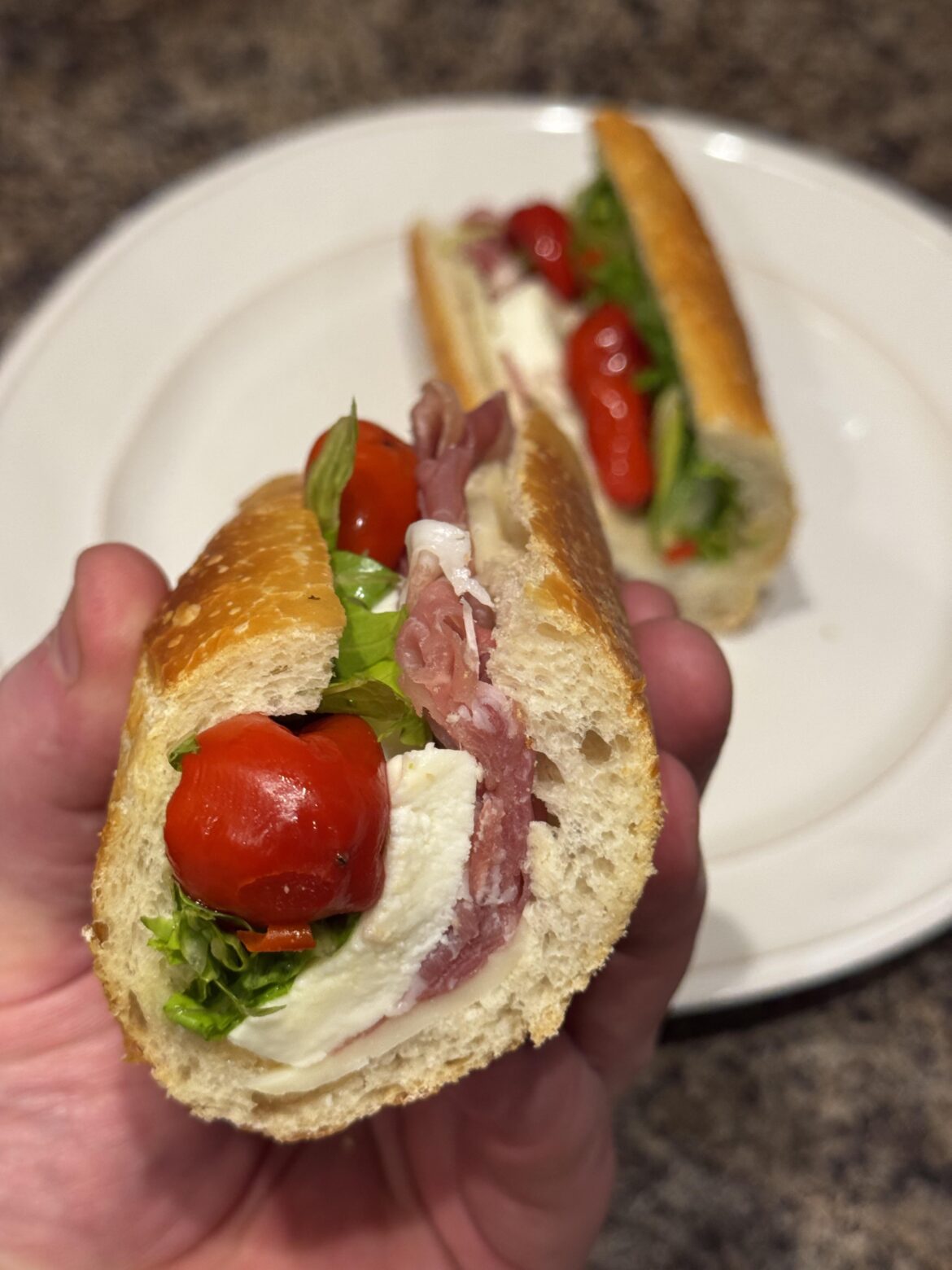 Prosciutto, sharp provolone, fresh mootz, romaine, & Peppadews on a baguette
