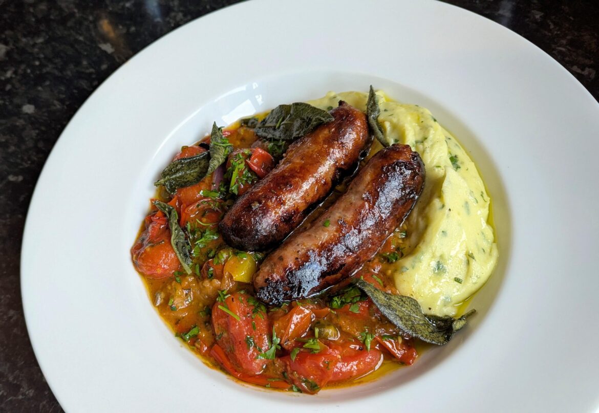 Fennel sausages, winter tomatoes and wild garlic mash