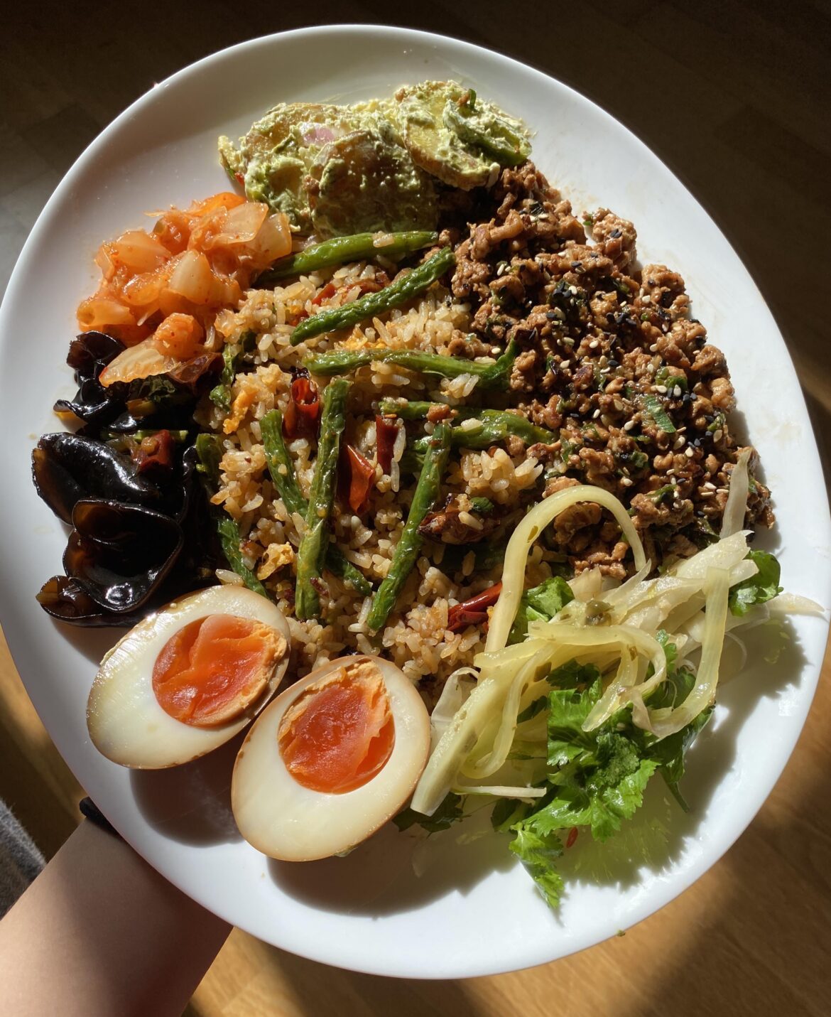 “Bibimbap” with leftovers, topped with a soy-marinated egg