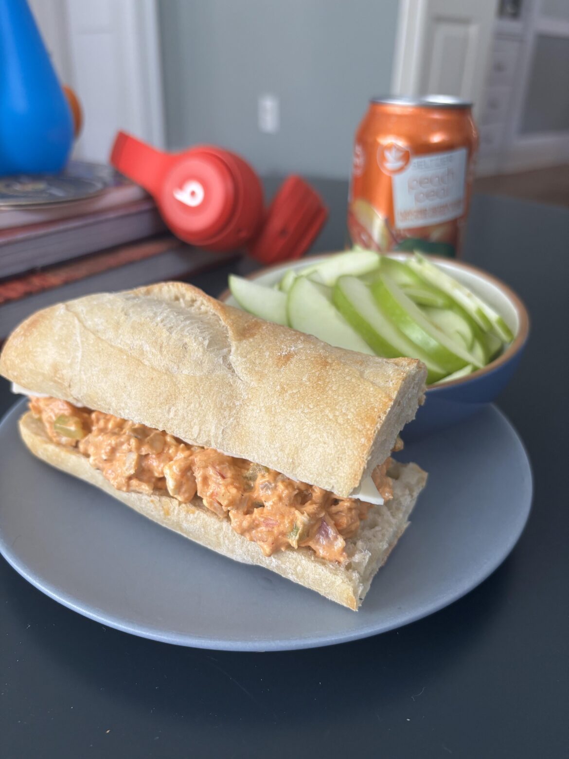 Buffalo chicken salad + white American cheese + fresh baked baguette
