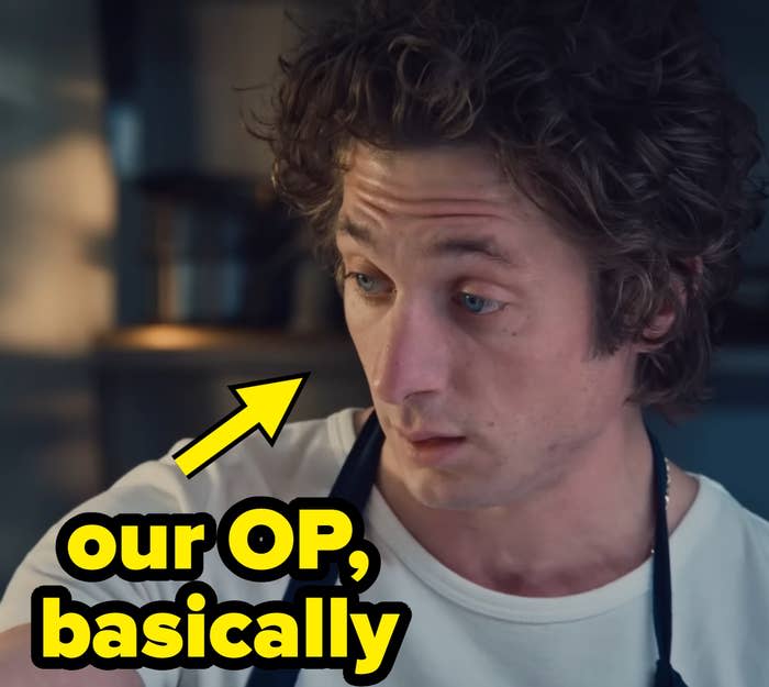 Person in a kitchen wearing a t-shirt and apron, looking intently to the side, with focus on facial expression. Disney+ logo in corner