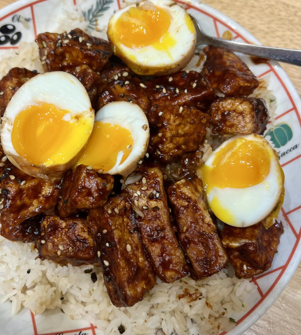 Simple ingredients, but the eggs make it feel luxurious! Marinaded eggs, tofu, and sticky rice
