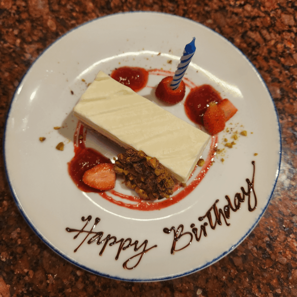 Lemon & Pistachio Cake, Red berry compote, Pistachio medallion