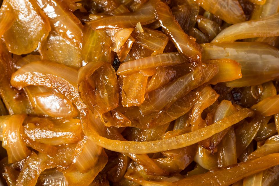 Close-up of caramelized onions, glistening with a slightly translucent texture