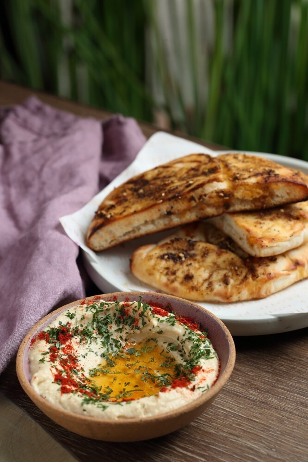 Bread and hummus is a staple, enlivened by balanced herbs and spices. Photo: Alex Chan