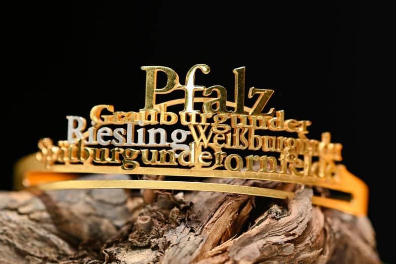 For the first time a man is competing for the title of the top wine ambassador in in the Pflaz region. Before the title was known as Wine Queen, as only women competed, but things have changed. Uwe Anspach/dpa