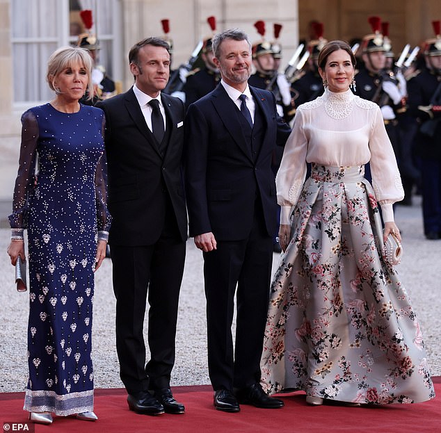 Brigitte, Emmanuel, Frederik, and Mary smiled for photographs on the red carpet before entering the Elysee Palace