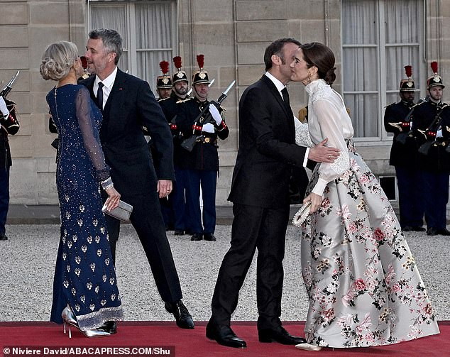 Mary and Frederik greeted Brigitte and Emmanuel with a friendly warmth before the state dinner on Monday evening