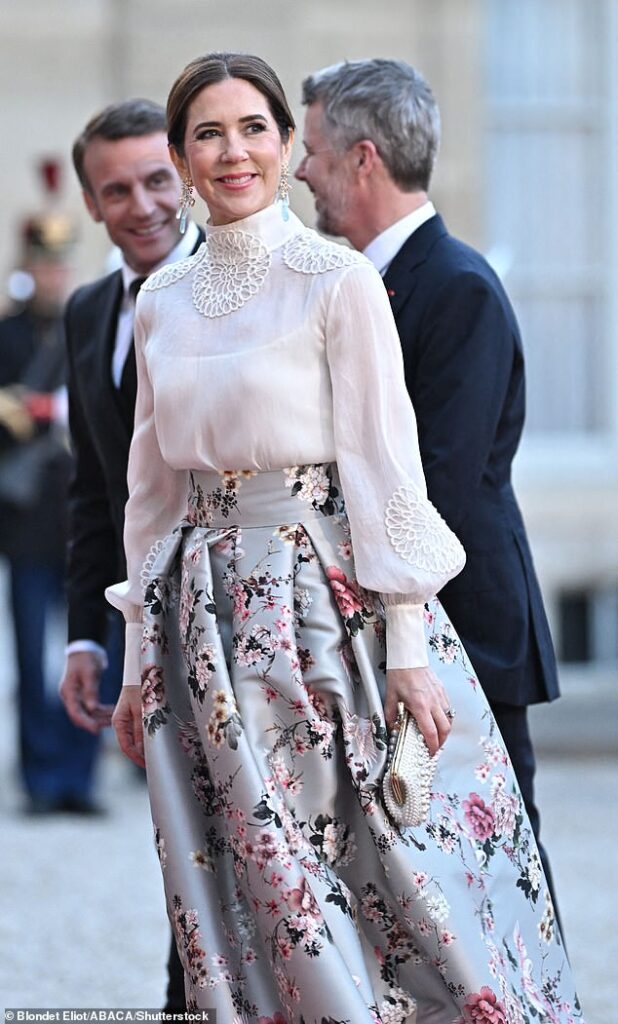Queen Mary of Denmark put on a sophisticated display for a state dinner at France's presidential Elysee Palace on Monday evening