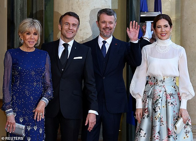 Frederik smiled as he waved to photographers while standing alongside Brigitte, Emmanuel, and Mary
