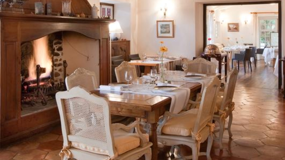 Dining by an open fire at Auberge Ostapé in the Basque Country. ©Ostapé