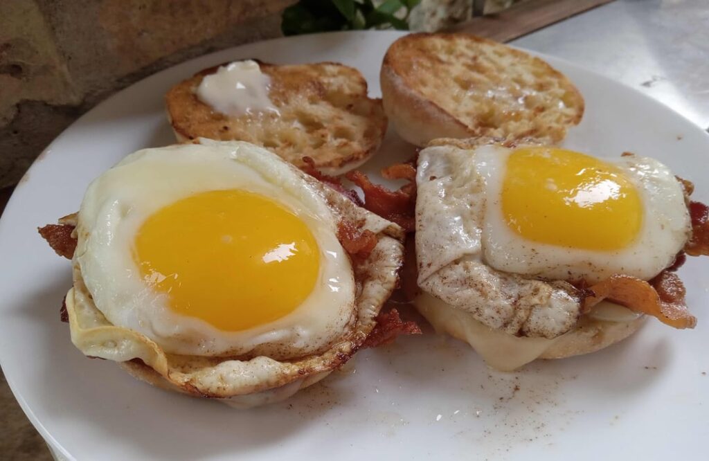 A couple dry-cured bacon, egg, and swiss cheese 'Breakfast Squirters'