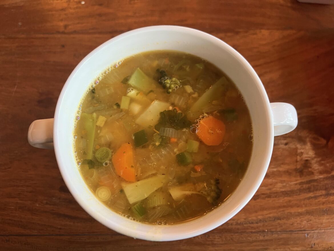 Golden soup with lemon, ginger, topinambur, miso, sesame oil, veggies and red lentils