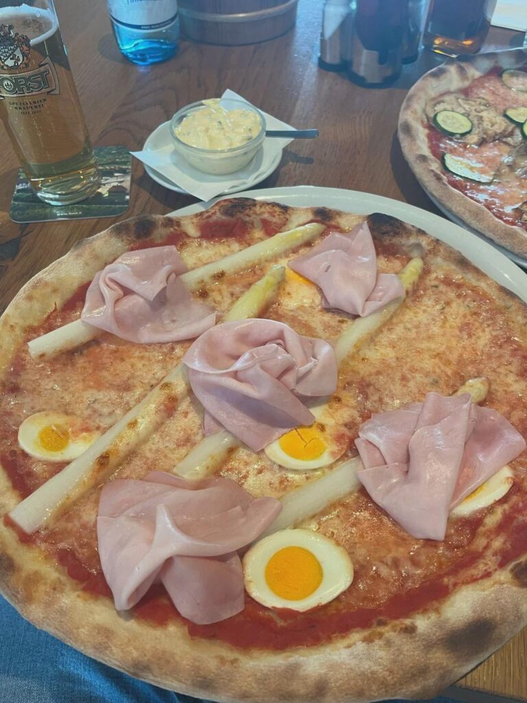 A friend keeps ordering this asparagus/hollandaise sauce/ham pizza and I think it’s diabolical