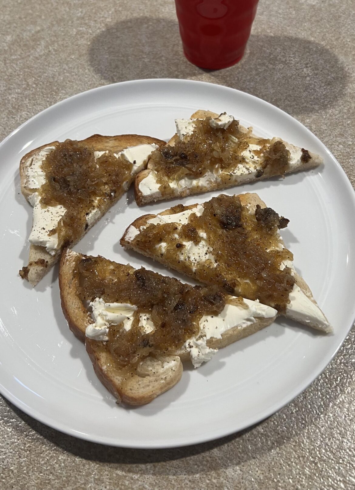 Carmelized a sweet organic onion for this cream cheese toast today. My breath with be legendary.
