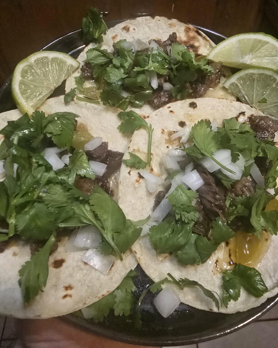 Waygu beef slow simmered with cilantro onion and pickled jalapeños