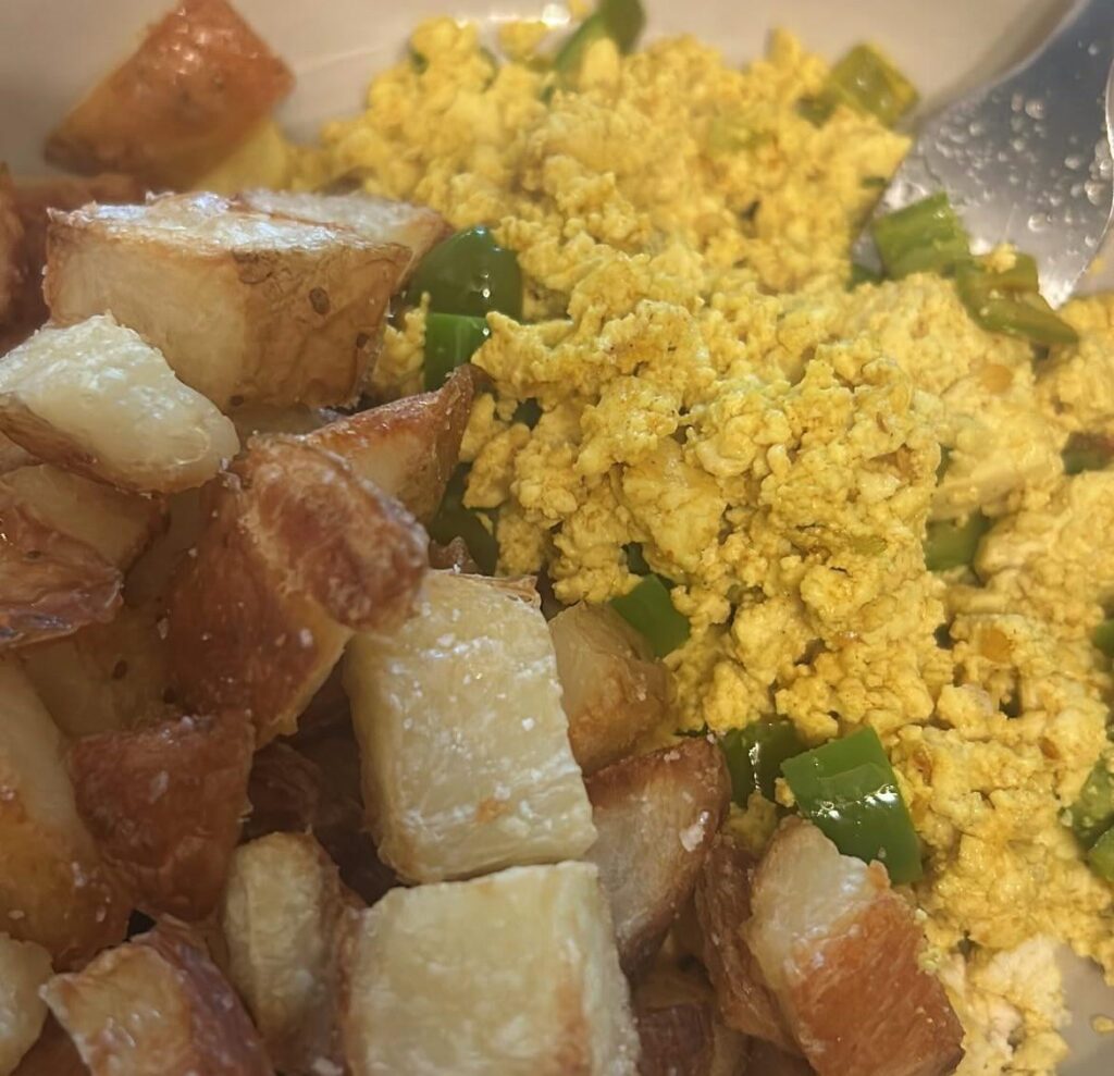 vegan spicy- tofu scramble with two serrano peppers. really good. i like eating vegan food thats pretty spicy