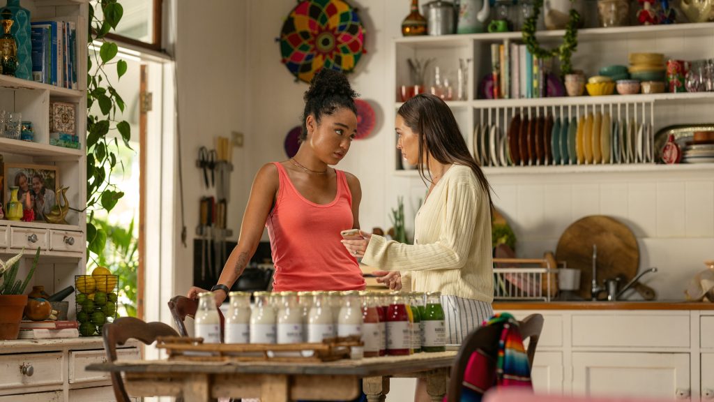 Apple Cider Vinegar Review — Another Run-of-the-Mill Scammer Story 3 Apple Cider Vinegar. (L to R) Aisha Dee as Chanelle, Alycia Debnam-Carey as Milla in Apple Cider Vinegar. Cr. Courtesy of Netflix © 2024