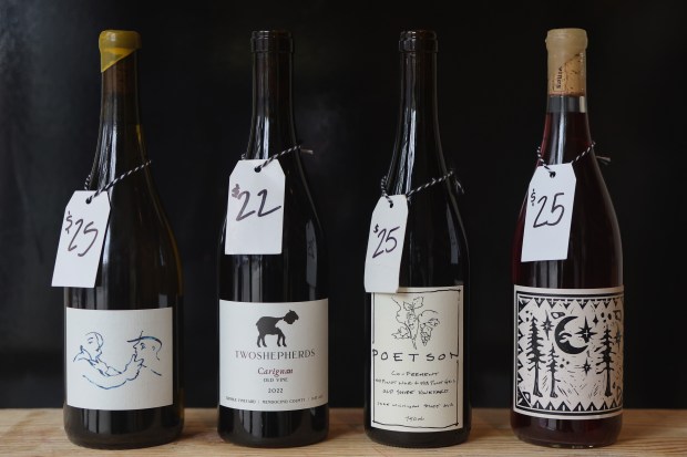 Bottles of Barbichette 2023 Le Blanc Seneca Lake Riesling, from left, Two Shepherds 2022 Old Vine Carignan, Poetson 2023 Co-Ferment Pinot Noir and Floréz 2023 Poilu's Pinard California Red Blend are available at Easy Does It bar, patio and shop at 2354 N. Milwaukee Ave., April 18, 2025, in Chicago. (John J. Kim/Chicago Tribune)