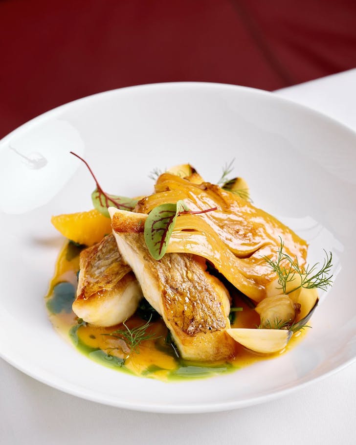 a plate of beautiful French food