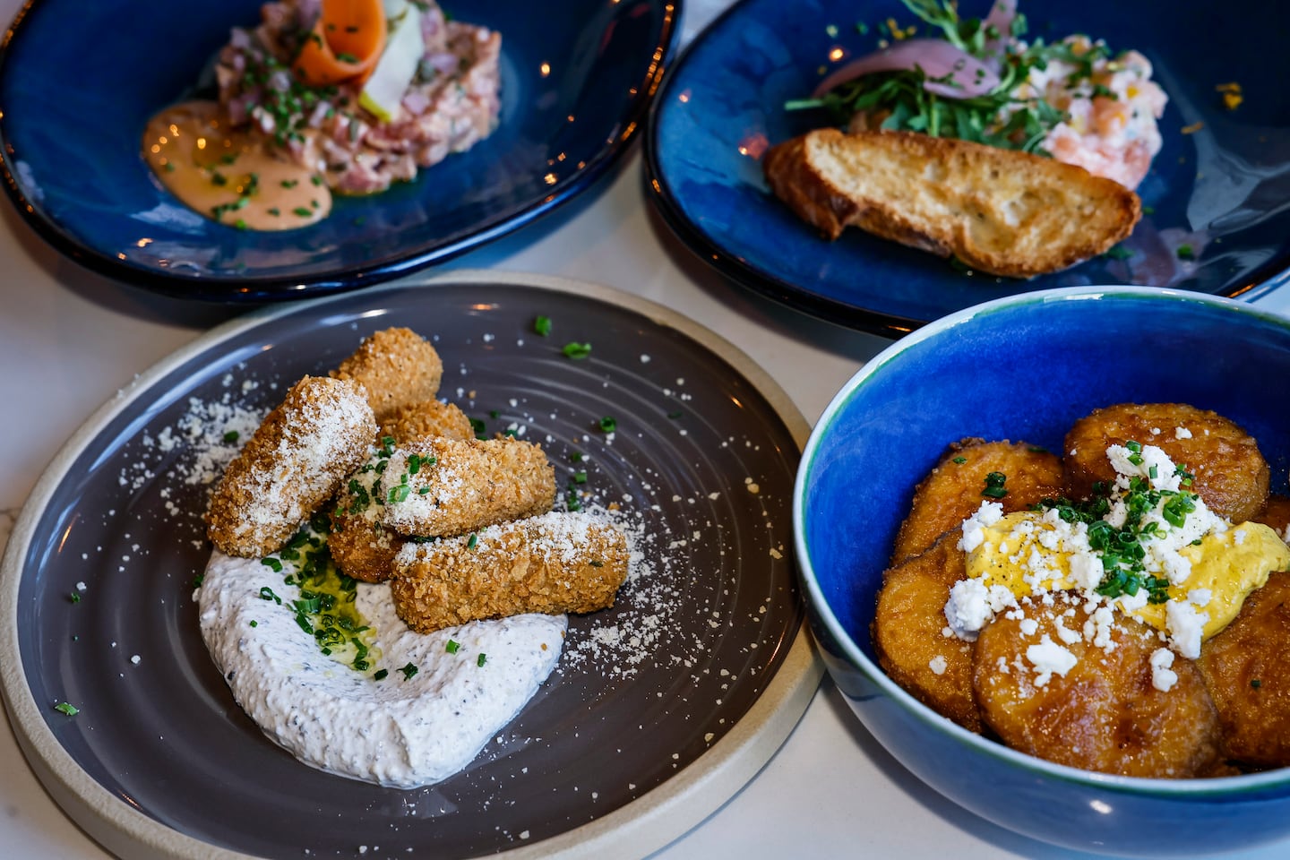 A selection of tapas showcases Café Saint-Germain's French-influenced small plates in Somerville.