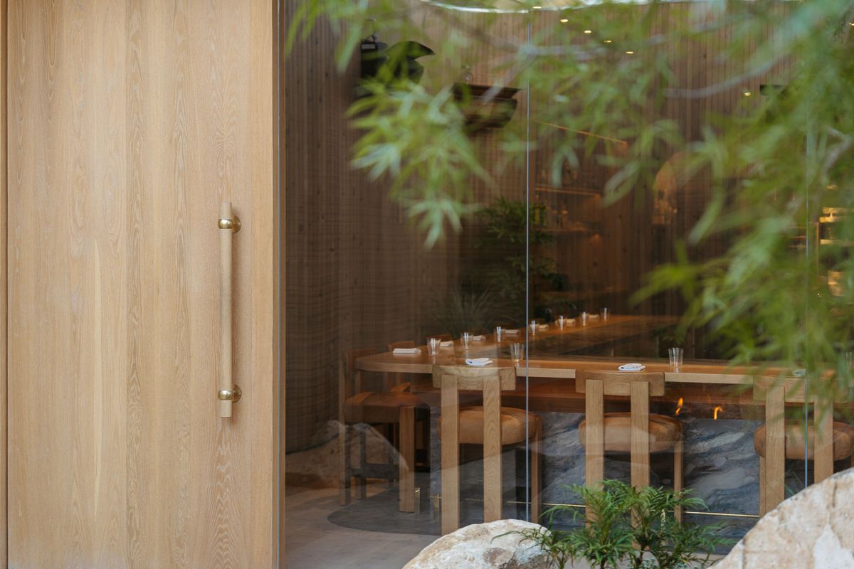 A modern dining room through the windows at Lilo.