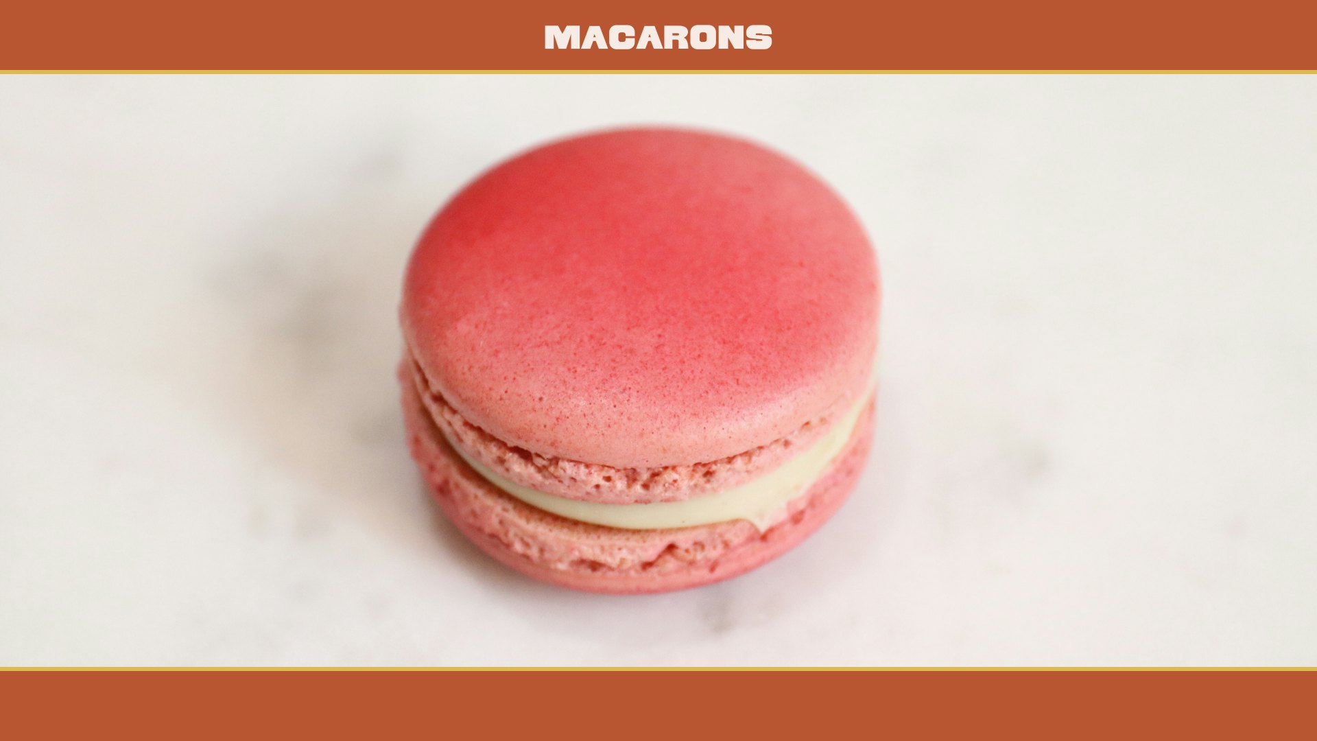 Up-close shot of a pink macaron