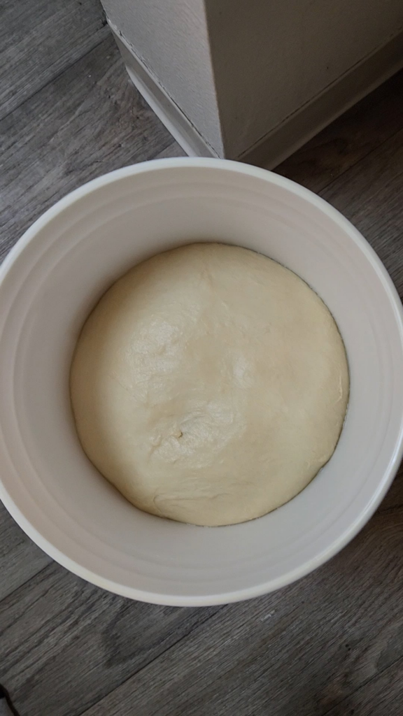 Punching down 11lbs of sourdough