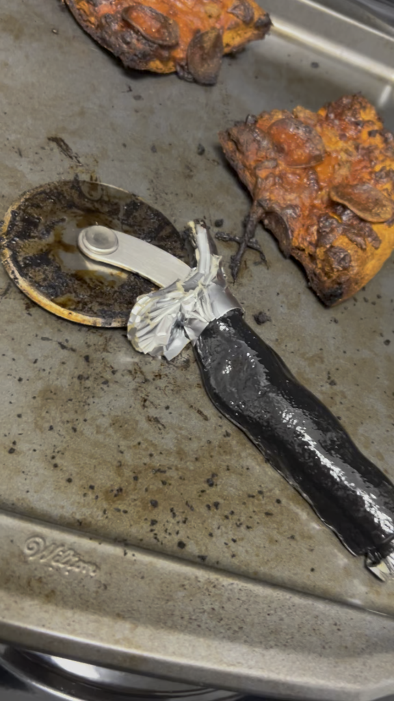 OOP left their Pizza Cutter in the Oven.