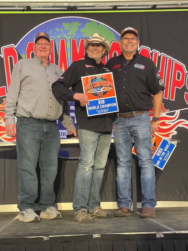 From left, Jim Compart, owner of Compart Family Farms; Brian Neale; and SCA co-founder Ken Phillips pose at the Steak Cookoff Association World Championships in Fort Worth, Texas in March. (Photo courtesy of Brian and Ann Neale)