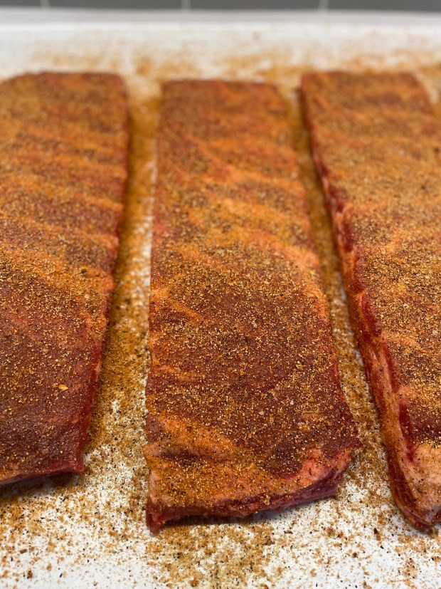 Prepped and seasoned pork spare ribs are ready for the smoker. (Photo courtesy of Brian and Ann Neale)