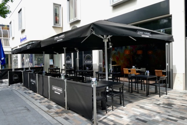 Mandatory Credit: Photo by Geoffrey Swaine/REX/Shutterstock (12080638m) Gordon Ramsay's new Surrey restaurant has officially opened and has been described as a real coup for Woking. The popular TV personality's first Street Burger restaurant outside of London, opened in Woking town centre for outdoor dining and takeaway. The restaurant in 57 Commercial Way occupies the ground floor of his eagerly-anticipated new cookery school, The Gordon Ramsay Academy, which will open in the autumn. Gordon Ramsay Street Burger restaurant a real coup for Woking as venue officially opens, Woking, Surrey, UK - 15 Jun 2021