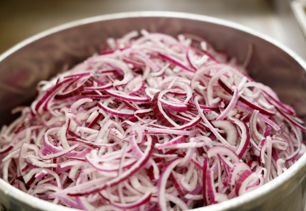 Raw red onions are used for french onion soup au gratin at Jo's Diner in Mission Hills on Tuesday, Feb. 25, 2025. (K.C. Alfred / The San Diego Union-Tribune)